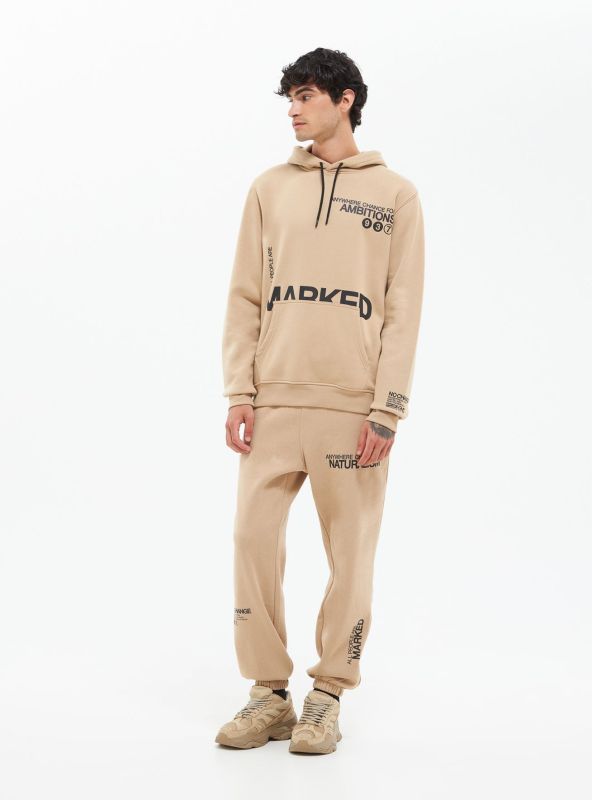 Joggers with lettering, light beige