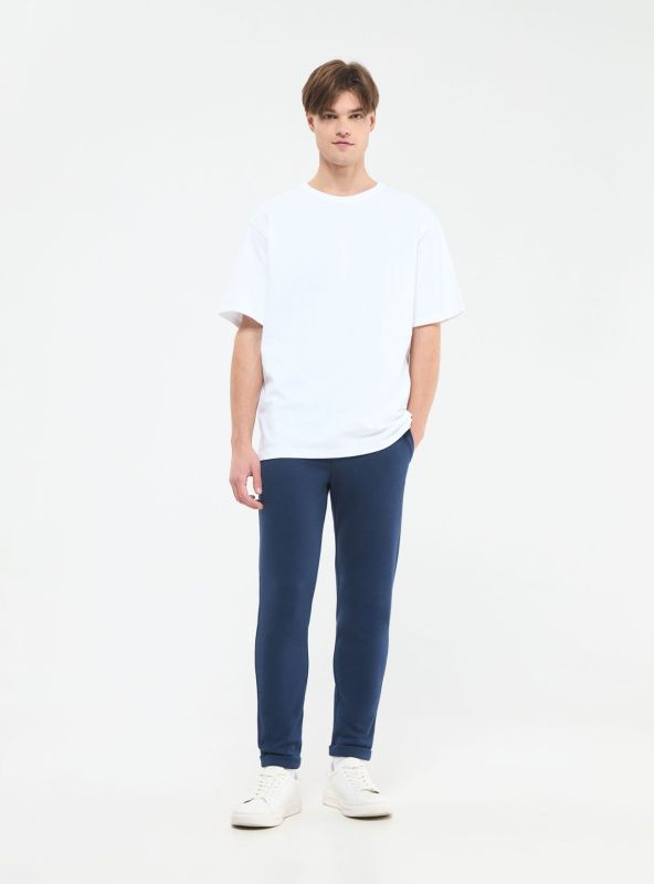 Plain jogger trousers in blue pique fabric