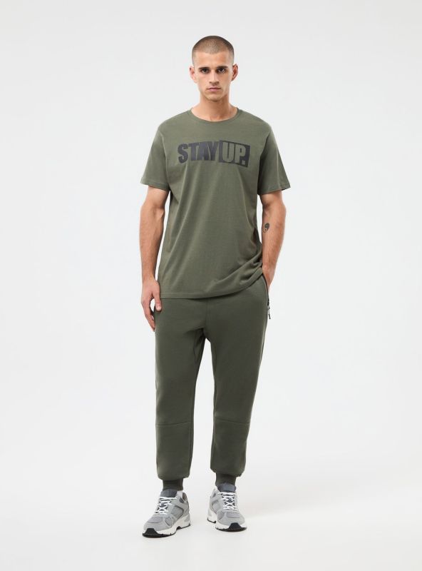 Men's sports trousers in plain technical fabric olive