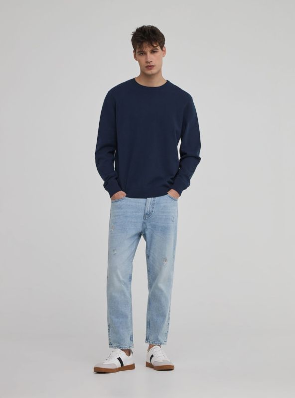 Relaxed jeans with ripped effect light blue